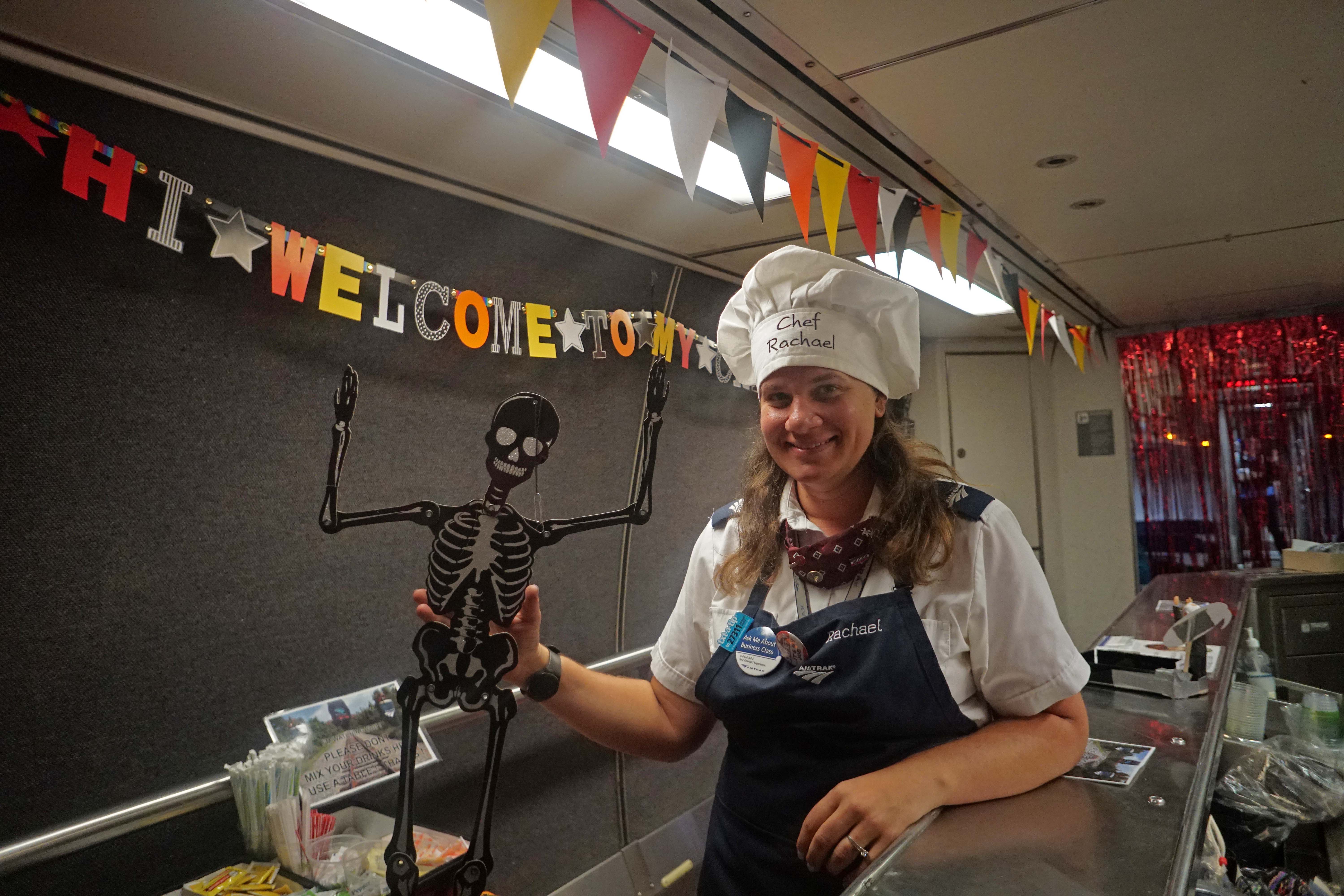 Woman with chefs hat, and haloween decorations