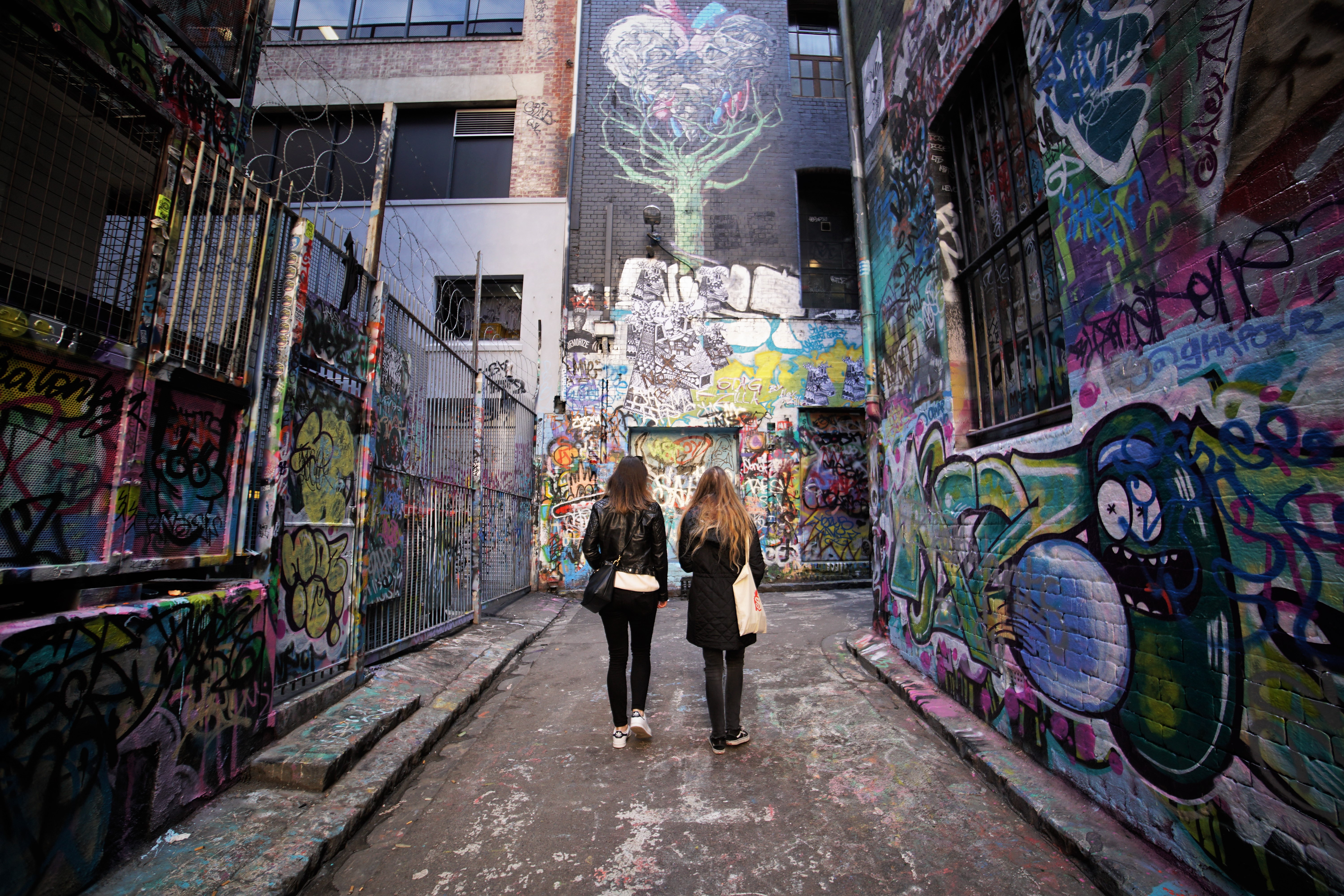 Top Things To Do in Melbourne street art laneways hosier lane grafitti travel wmen